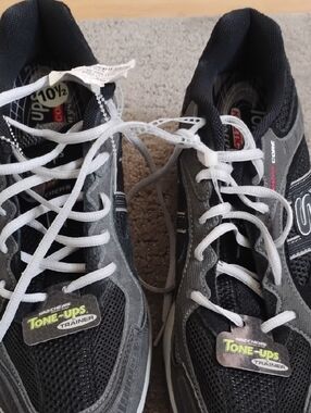 Skechers Tone-Ups Men’s Trainer in Black, Gray and White